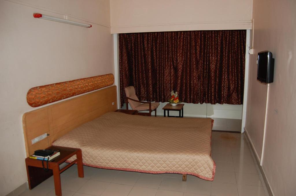 Hotel Raviraj Pune Bilik gambar