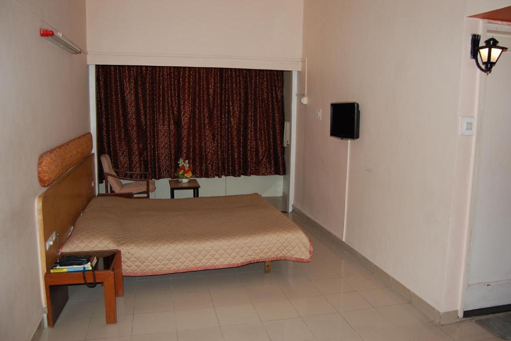 Hotel Raviraj Pune Bilik gambar